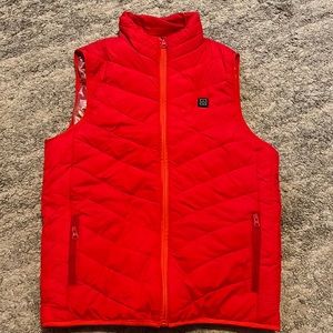 Puffer jacket. Red with pockets on inside and outside of jacket.